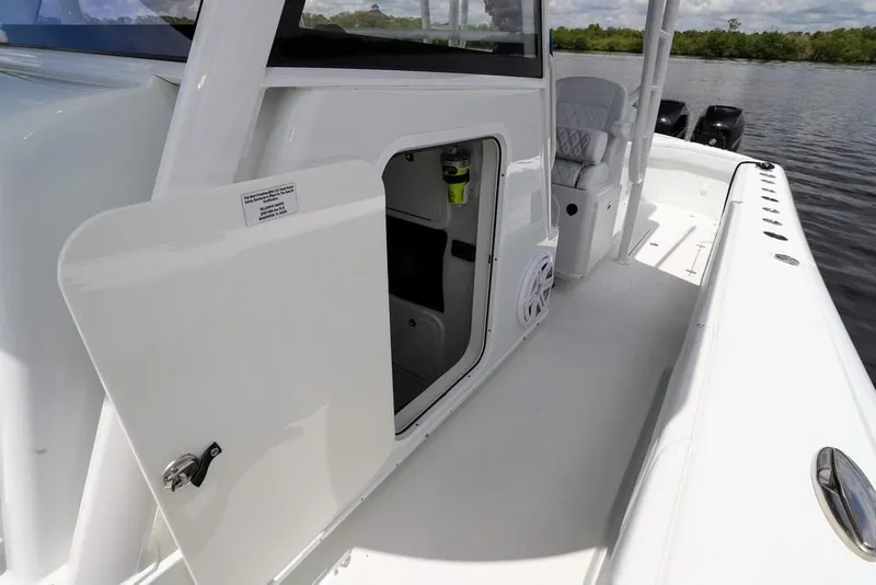 Slide: The Image of 2020 Yellowfin 39 Offshore boat interior with open storage compartment. - 41