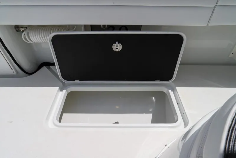 Slide: The Image of Open storage compartment on a 2020 Yellowfin 39 Offshore boat. - 46