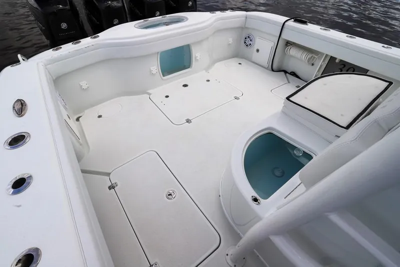 Slide: The Image of 2020 Yellowfin 39 Offshore boat deck with storage compartments and seating. - 51