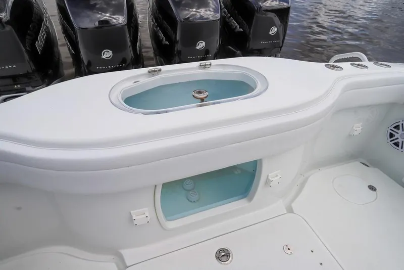 Slide: The Image of 2020 Yellowfin 39 Offshore boat with livewell and Mercury outboard engines. - 53