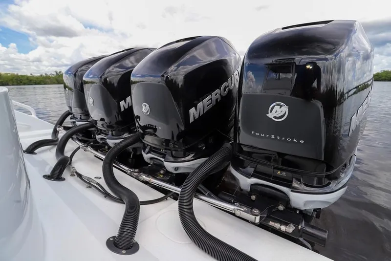 Slide: The Image of Four Mercury outboard engines on a 2020 Yellowfin 39 Offshore boat. - 54