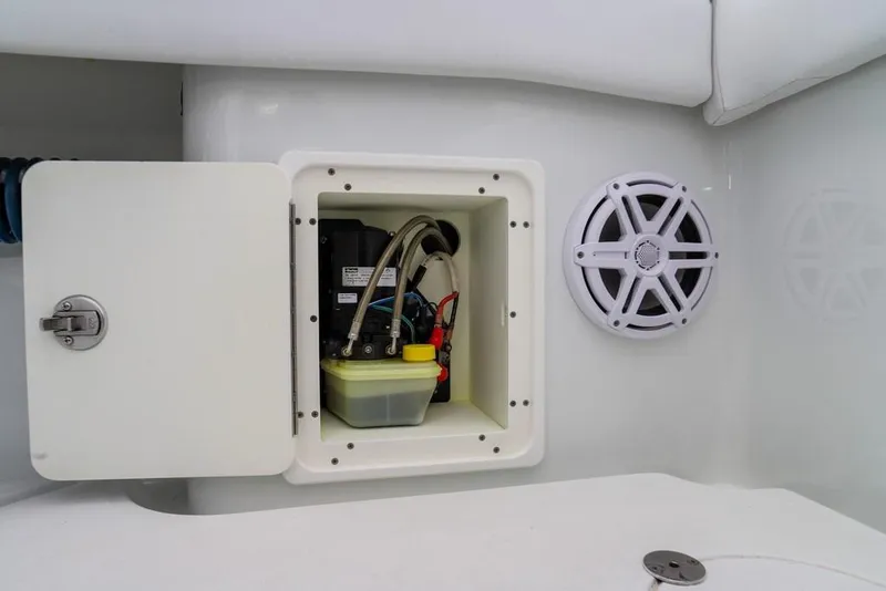 Slide: The Image of 2020 Yellowfin 39 Offshore boat compartment with speaker and wiring. - 56