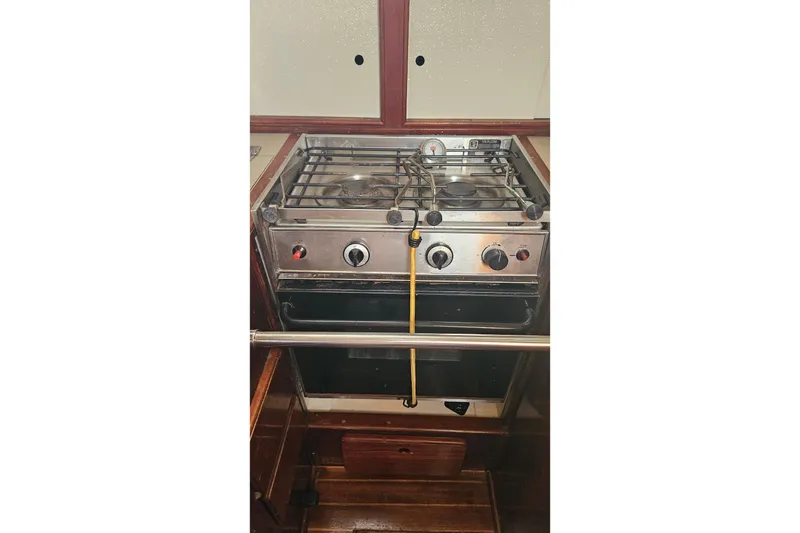 Slide: The Image of 1982 Morgan 462 sailboat deck with rigging and storage box. - 64