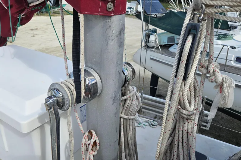Slide: The Image of Close-up of a 1982 Morgan 462 sailboat mast with ropes and winch. - 20