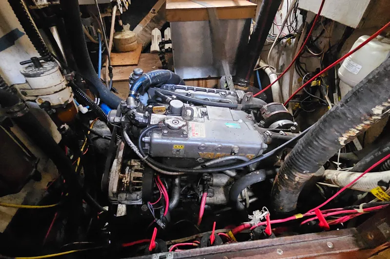 Slide: The Image of 1982 Morgan 462 engine compartment with visible wiring and components. - 49