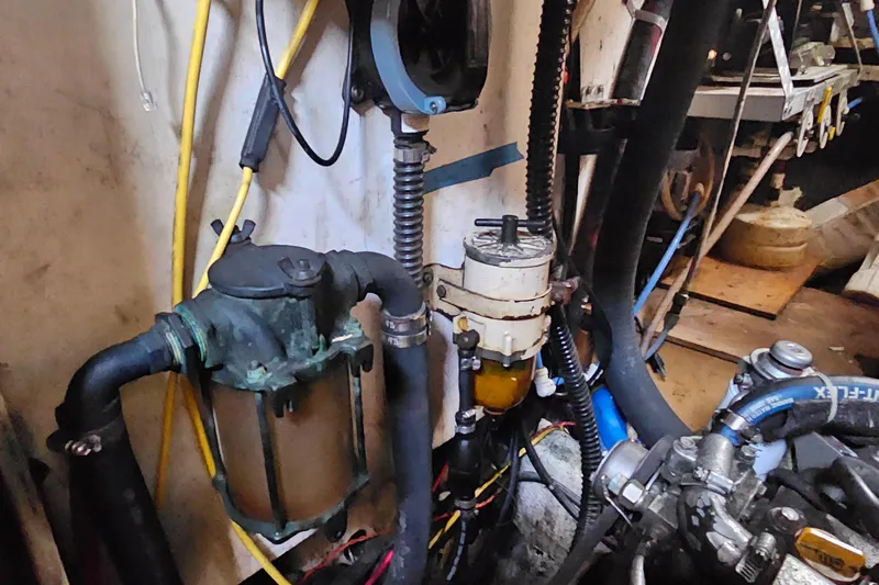 Slide: The Image of Engine room of a 1982 Morgan 462, showcasing mechanical components and wiring. - 53