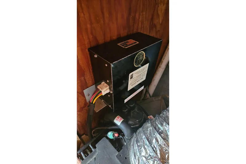 Slide: The Image of 1982 Morgan 462 electrical component with wiring, mounted on wooden surface. - 61