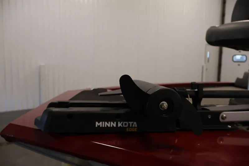 Slide: The Image of 2022 Tracker Pro 170 boat with Minn Kota Edge trolling motor in a garage. - 13