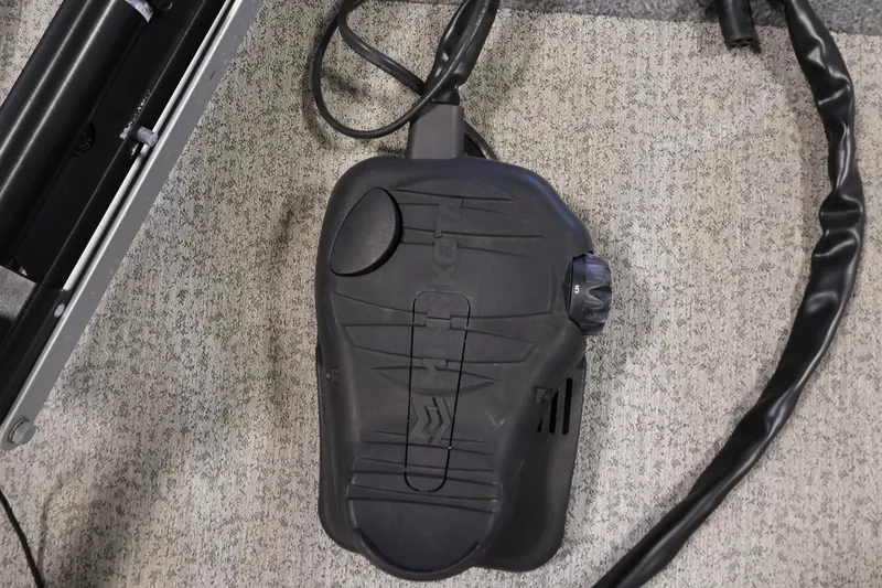Slide: The Image of Foot pedal control for 2022 Tracker Pro 170 boat on carpeted surface. - 14
