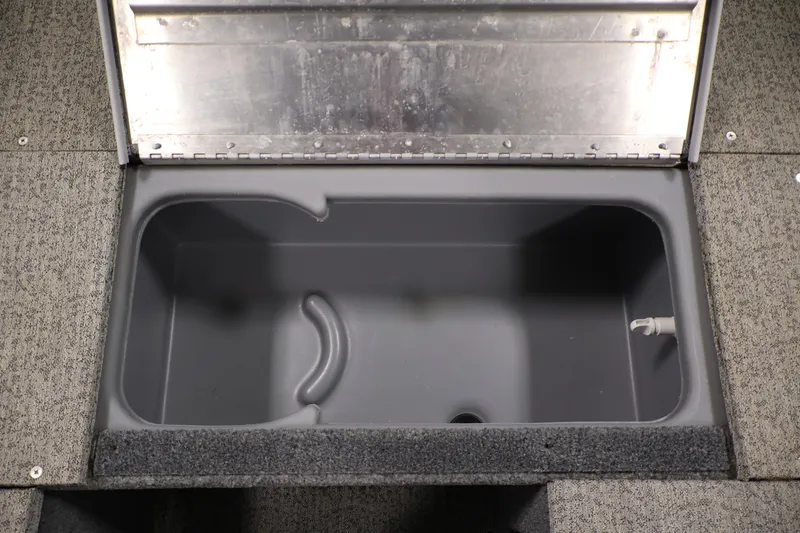 Slide: The Image of Open storage compartment in 2022 Tracker Pro 170 boat. - 16