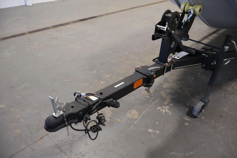 Slide: The Image of Trailer hitch of a 2022 Tracker Pro 170 boat on a concrete floor. - 33