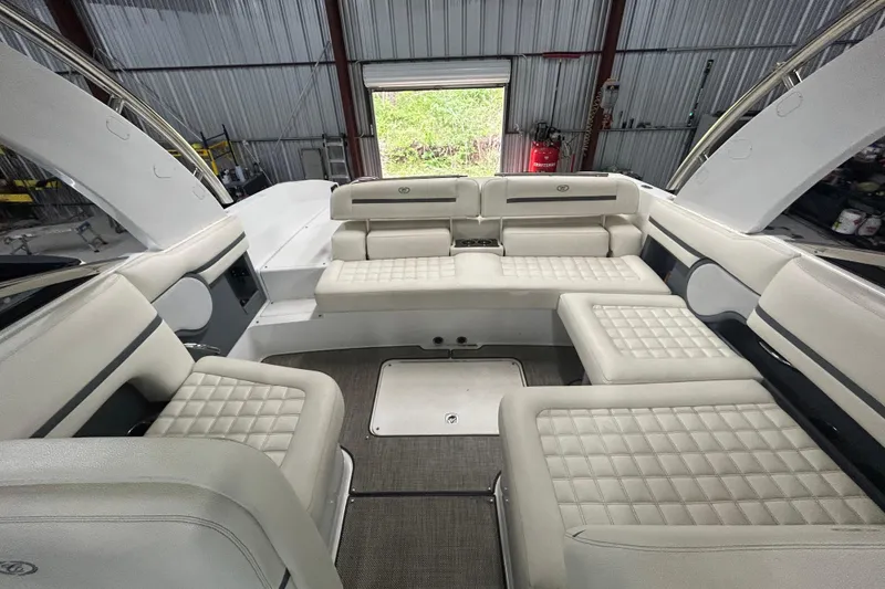 Slide: The Image of Luxurious interior of a 2017 Cobalt R30 boat with plush seating in a spacious cabin. - 16