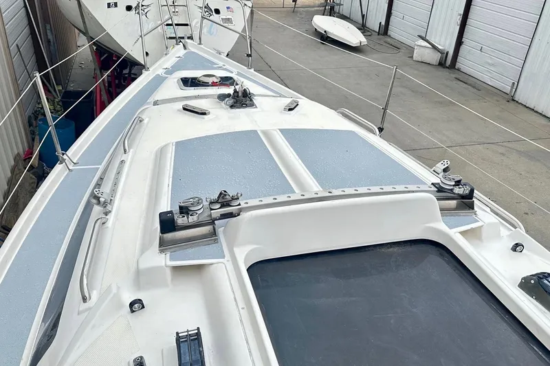 Slide: The Image of 1996 Hunter Marine 280 sailboat deck view in a storage area. - 10