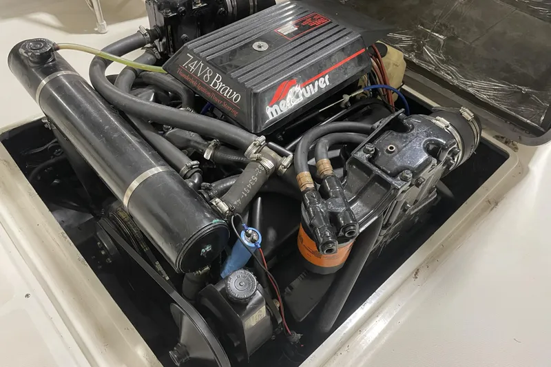 Slide: The Image of Engine compartment of a 1993 Limestone Express boat with MerCruiser 7.4L V8 Bravo engine. - 10
