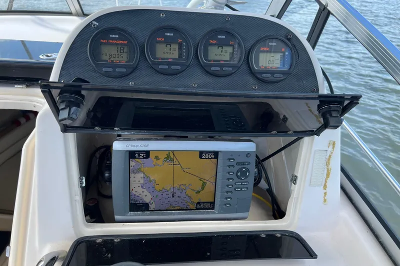 Slide: The Image of Dashboard of 2005 Grady-White Islander 270 with GPS and gauges. - 8