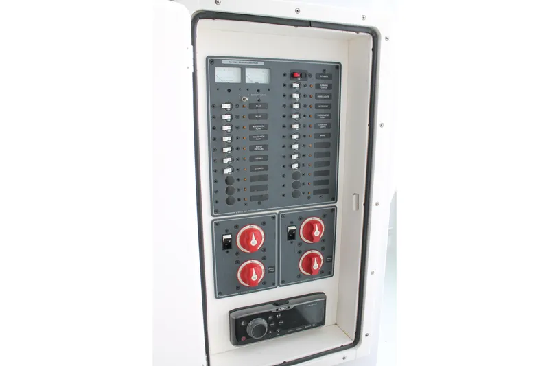 Slide: The Image of Electrical control panel on a 2015 Stamas Americana 26 boat. - 17