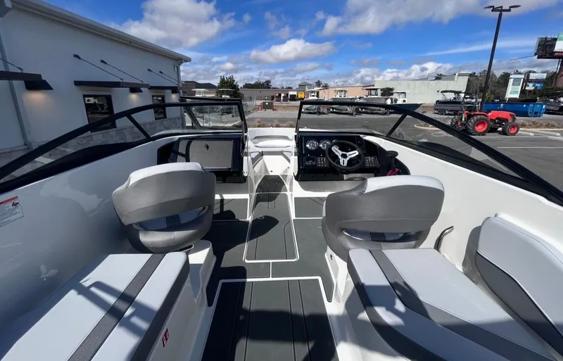 Slide: The Image of Interior view of 2026 Bayliner V20 boat with modern seating. - 12