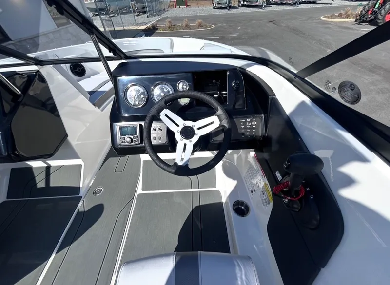 Slide: The Image of Interior view of 2026 Bayliner V20 boat with modern cockpit. - 14