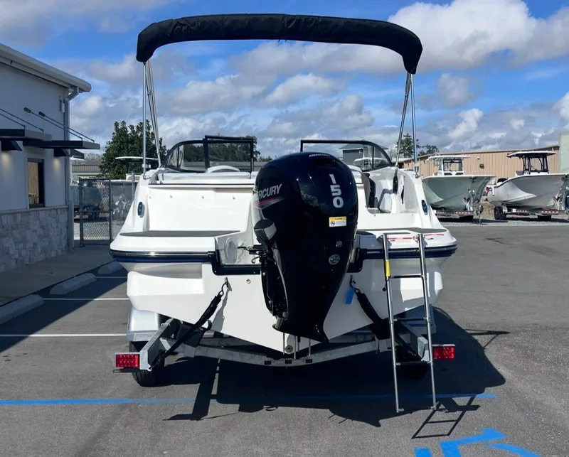 Slide: The Image of Bayliner V20 2026 with Mercury 150 outboard motor in parking lot. - 5