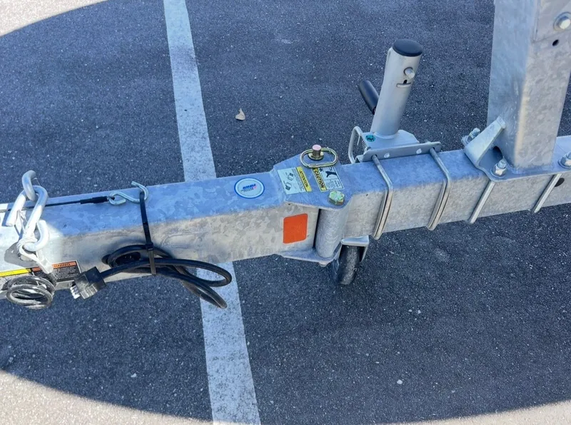 Slide: The Image of Trailer hitch of a 2026 Bayliner V20 boat. - 9