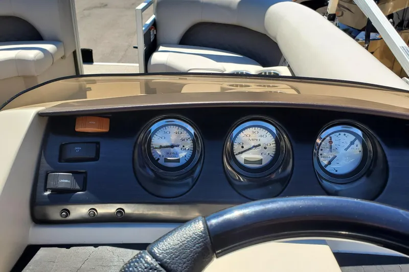 Slide: The Image of Dashboard of a 2019 Bennington SX 23 SPDXP boat with gauges and controls. - 10