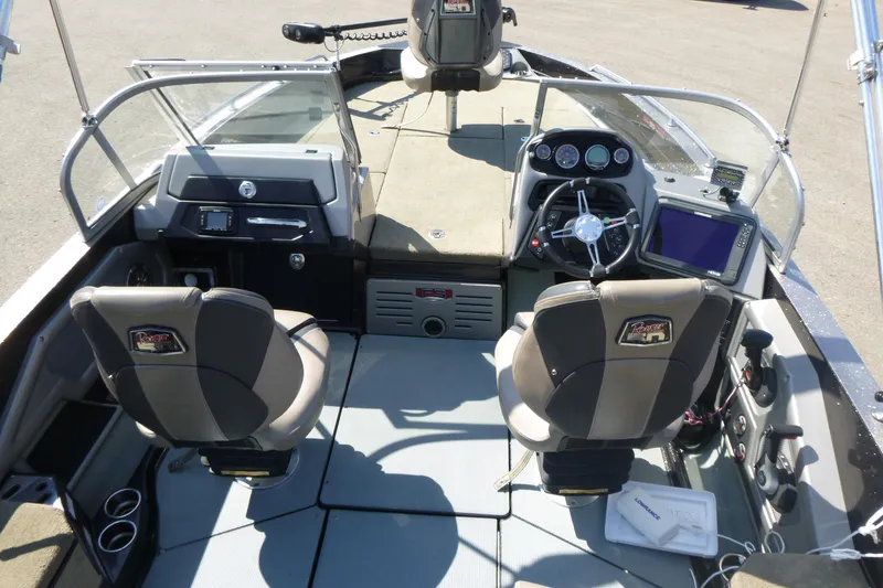 Slide: The Image of 2019 Ranger 620FS Fisherman boat interior with steering wheel, seats, and control panel. - 6