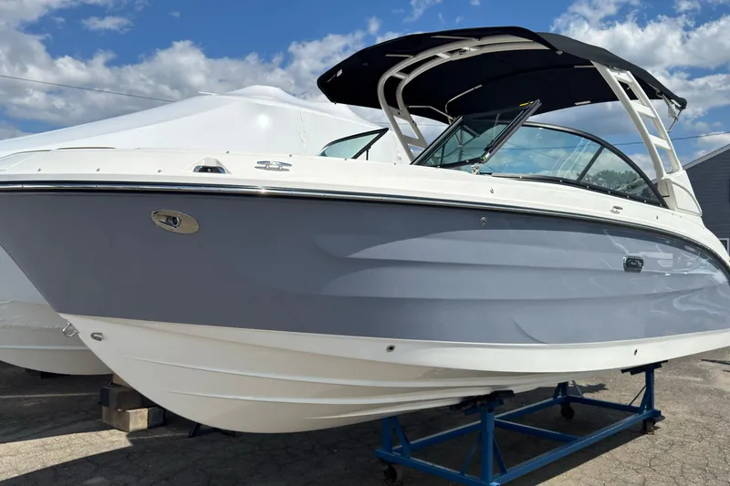 Slide: The Image of 2026 Sea Ray SDX 250 Outboard boat with sleek design on display. - 1