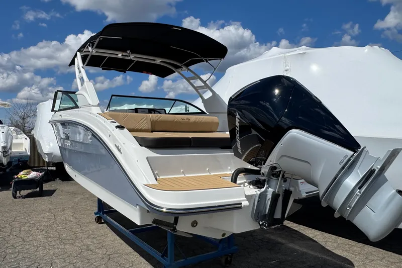 Slide: The Image of 2026 Sea Ray SDX 250 Outboard boat with sleek design and powerful engine. - 3