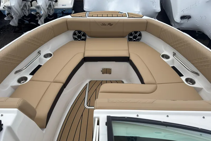 Slide: The Image of Luxurious seating area on 2026 Sea Ray SDX 250 Outboard boat with tan upholstery. - 39