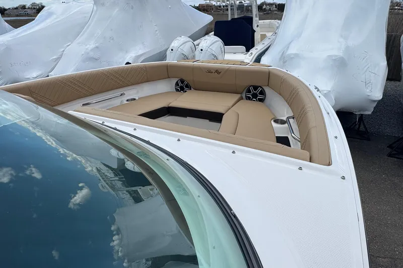 Slide: The Image of 2026 Sea Ray SDX 250 Outboard boat with luxurious seating and sleek design. - 40