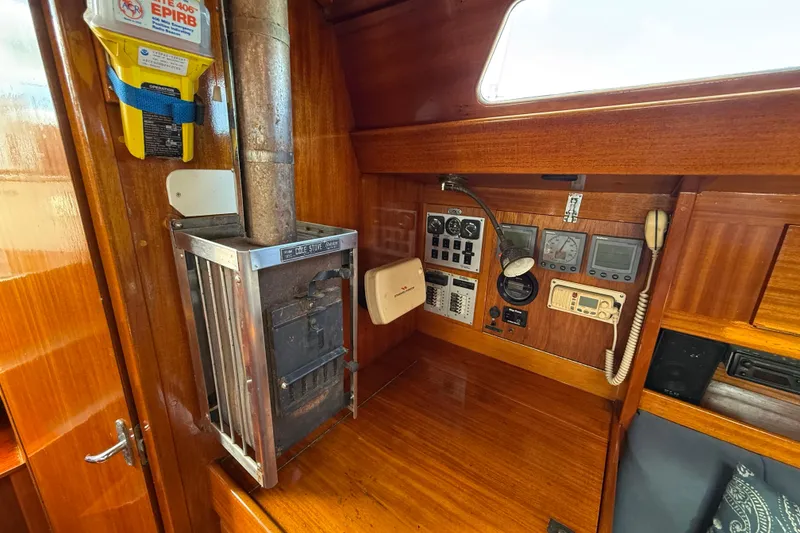 Slide: The Image of Control panel and stove inside a 1986 Vindo 45 sailboat cabin. - 14