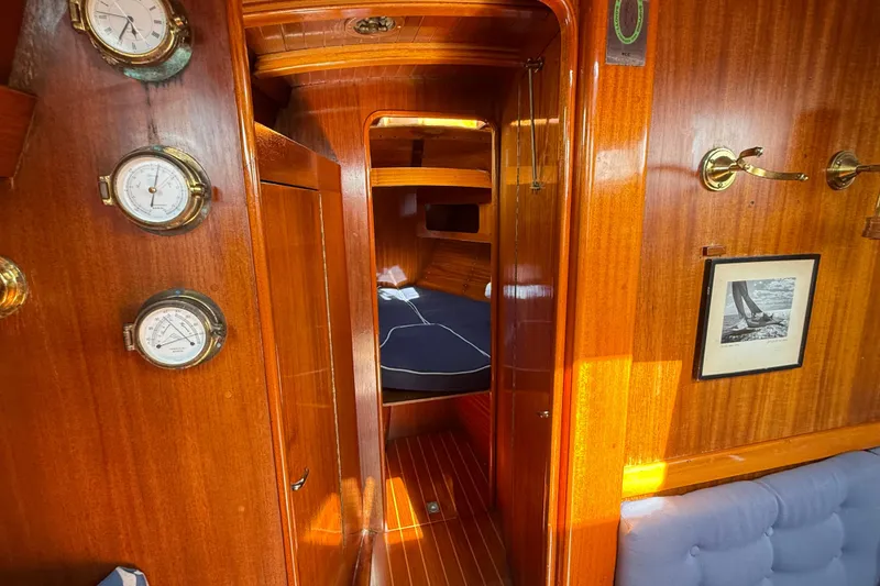 Slide: The Image of Interior of 1986 Vindo 45 yacht with wooden finish and nautical instruments. - 17