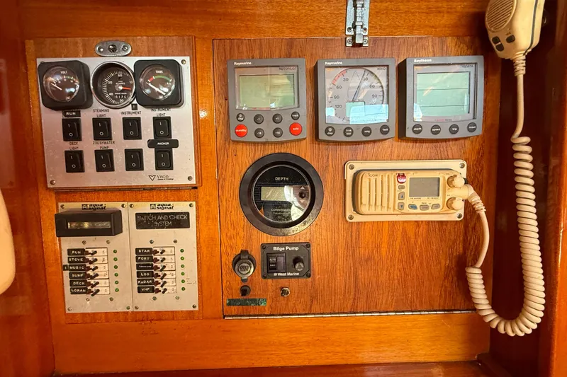 Slide: The Image of Control panel of a 1986 Vindo 45 sailboat with gauges and switches. - 20