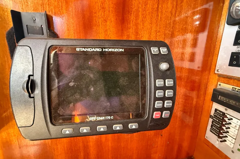 Slide: The Image of Standard Horizon GPS Chart 170C on 1986 Vindo 45 yacht's wooden dashboard. - 21