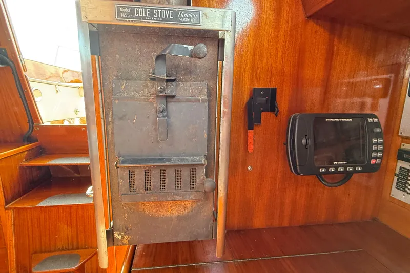 Slide: The Image of Vintage Vindo 45 boat interior with Cole Stove and navigation equipment, 1986 model. - 22