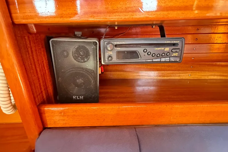 Slide: The Image of Wooden interior of 1986 Vindo 45 with JVC CD receiver and KLH speaker. - 23
