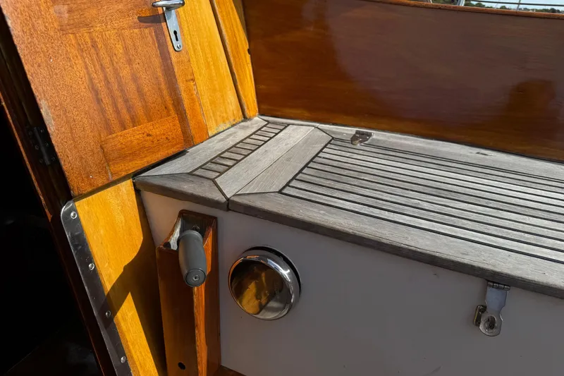 Slide: The Image of Wooden deck and hatch detail on a 1986 Vindo 45 sailboat. - 53