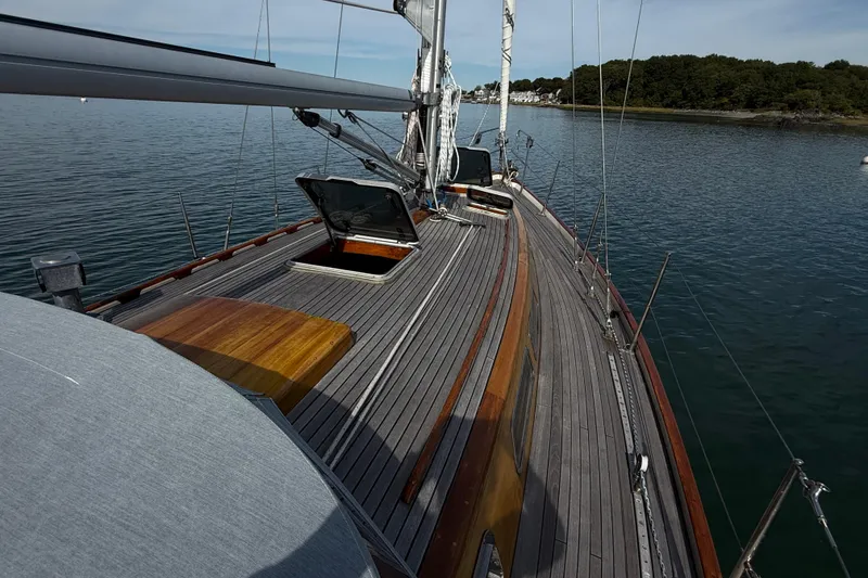 Slide: The Image of Sailing yacht Vindo 45, 1986 model, with open hatches on a calm sea. - 59