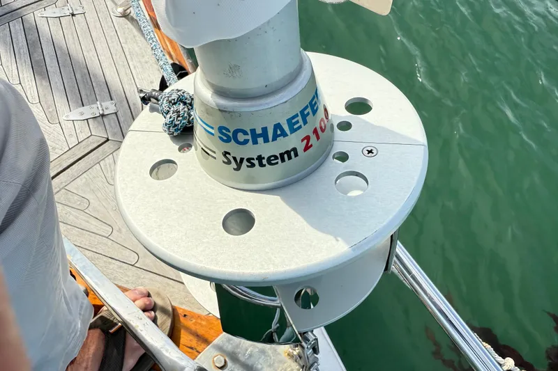 Slide: The Image of Schaefer System 2100 on 1986 Vindo 45 sailboat deck, near water. - 71