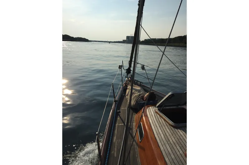 Slide: The Image of Sailing on a 1986 Vindo 45 yacht, calm waters, sunny day. - 78