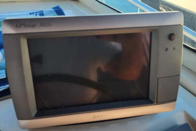 Slide: The Image of Garmin GPSmap 740s on 2003 Mainship Pilot 30-II boat dashboard. - 20