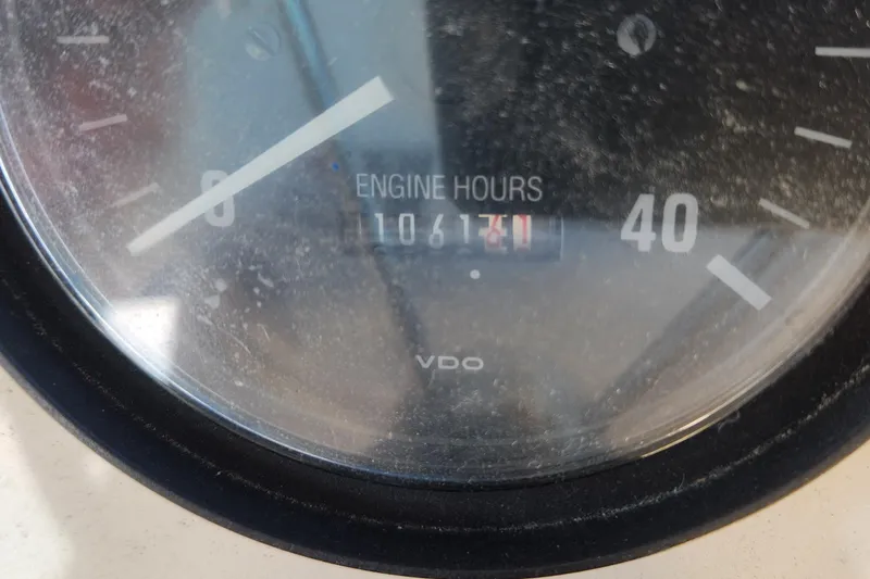 Slide: The Image of Close-up of a 2003 Mainship Pilot 30-II engine hour meter showing 1061.3 hours. - 27