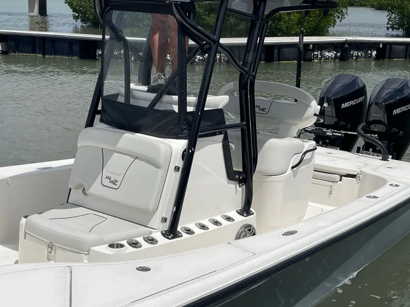 Slide: The Image of 2023 SeaVee 270 Z boat with Mercury engines on water. - 17