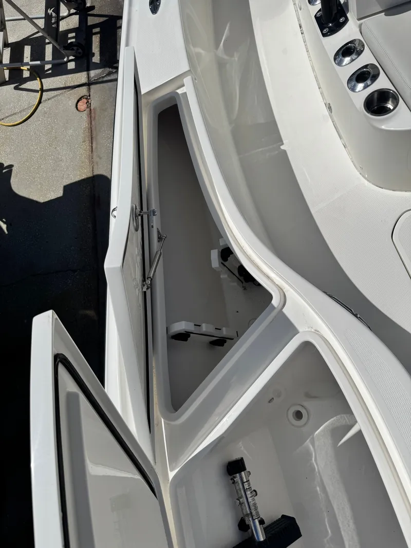 Slide: The Image of Interior view of 2023 SeaVee 270 Z boat storage compartments. - 27
