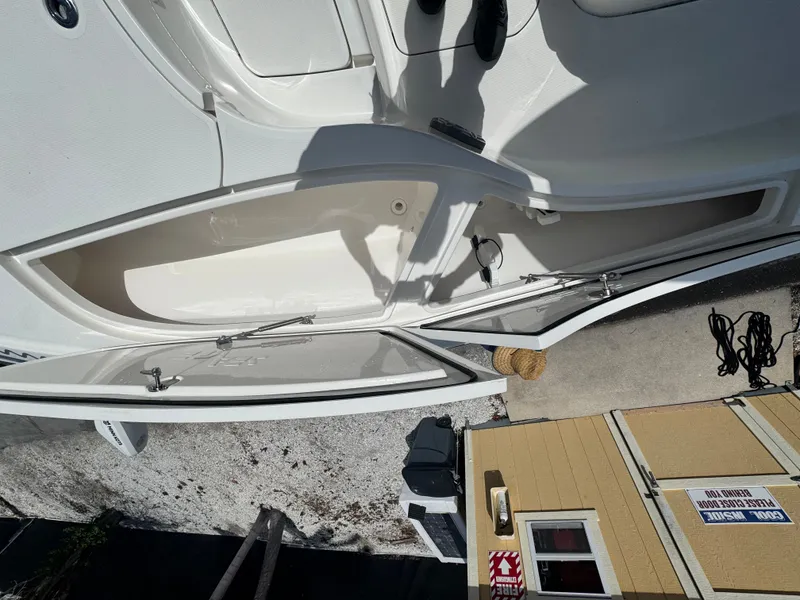 Slide: The Image of Open storage compartment on a 2023 SeaVee 270 Z boat. - 31