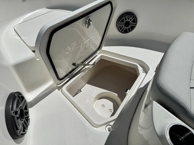 Slide: The Image of Interior of 2023 SeaVee 270 Z with storage compartment and speaker. - 39