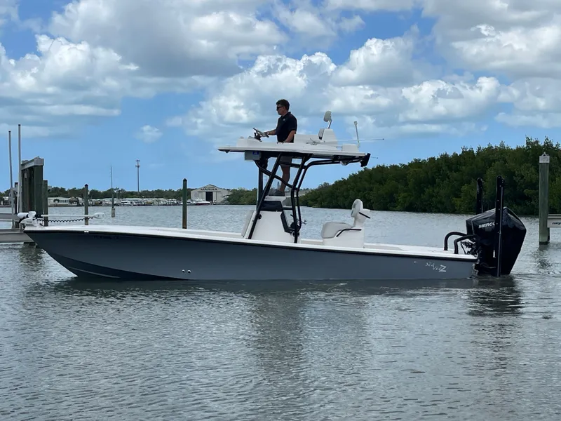 Slide: The Image of 2023 SeaVee 270 Z boat on calm water under blue sky. - 5