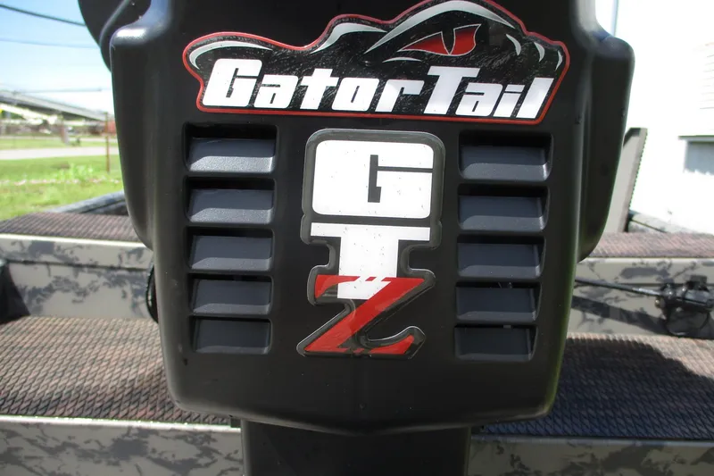 Slide: The Image of Close-up of 2026 Gator Tail 1860 Extreme boat engine with logo. - 10