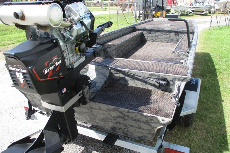 Slide: The Image of 2026 Gator Tail 1860 Extreme boat with powerful motor, camo design, and spacious interior. - 4