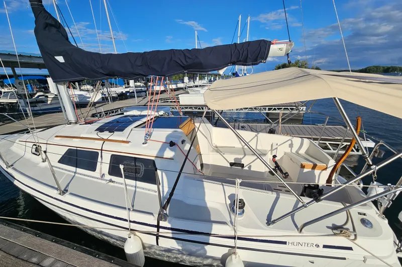 Slide: The Image of Sailboat docked at marina, 1992 Hunter 27 model, sunny day, clear blue sky. - 4